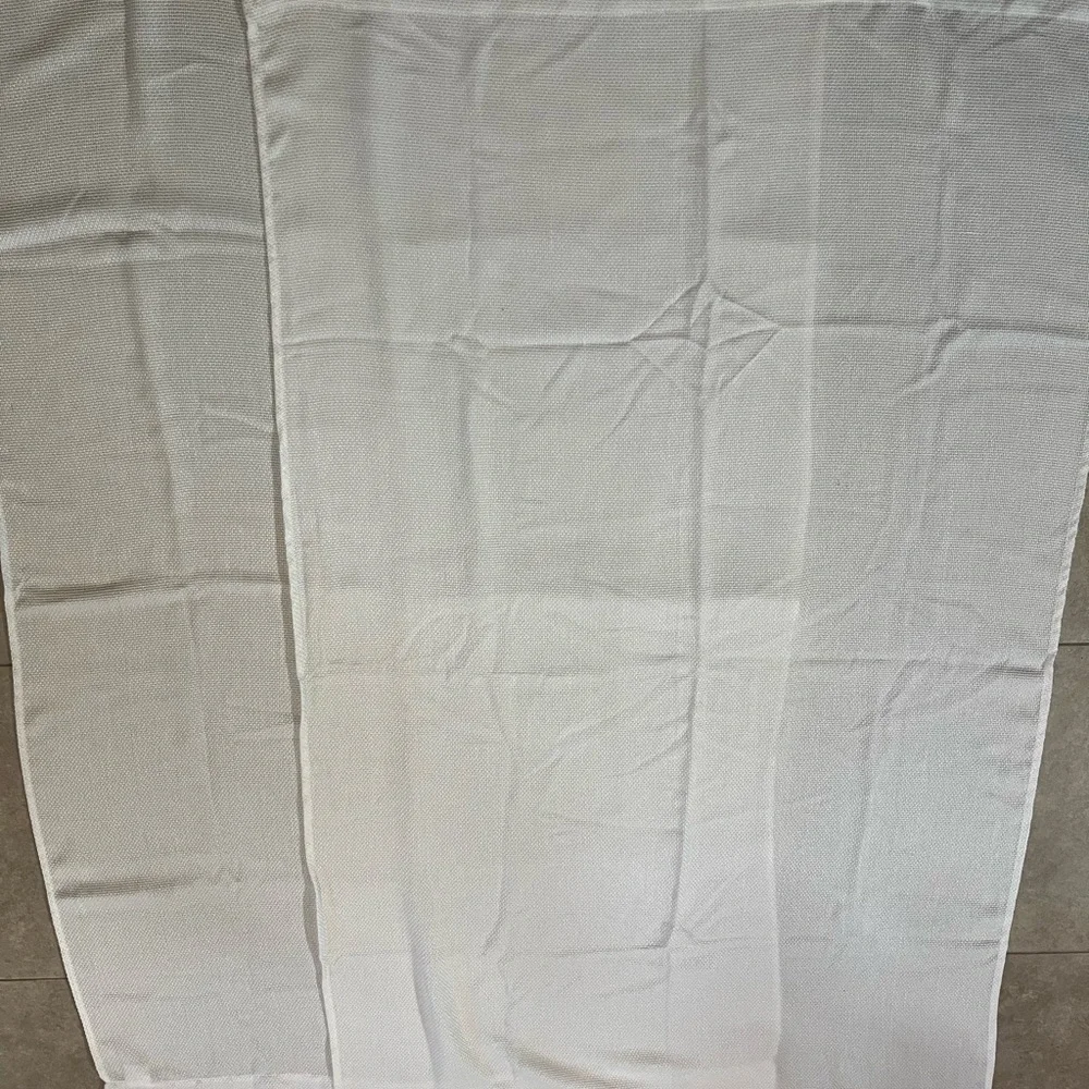 2 Panels Of White Textured Fabric Curtains Each are 63x36